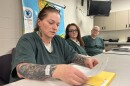 Cassie Oliveira reads from an autobiographical essay she wrote for a memoir class at the Barnstable County Correctional Facility, Jan. 8, 2026.