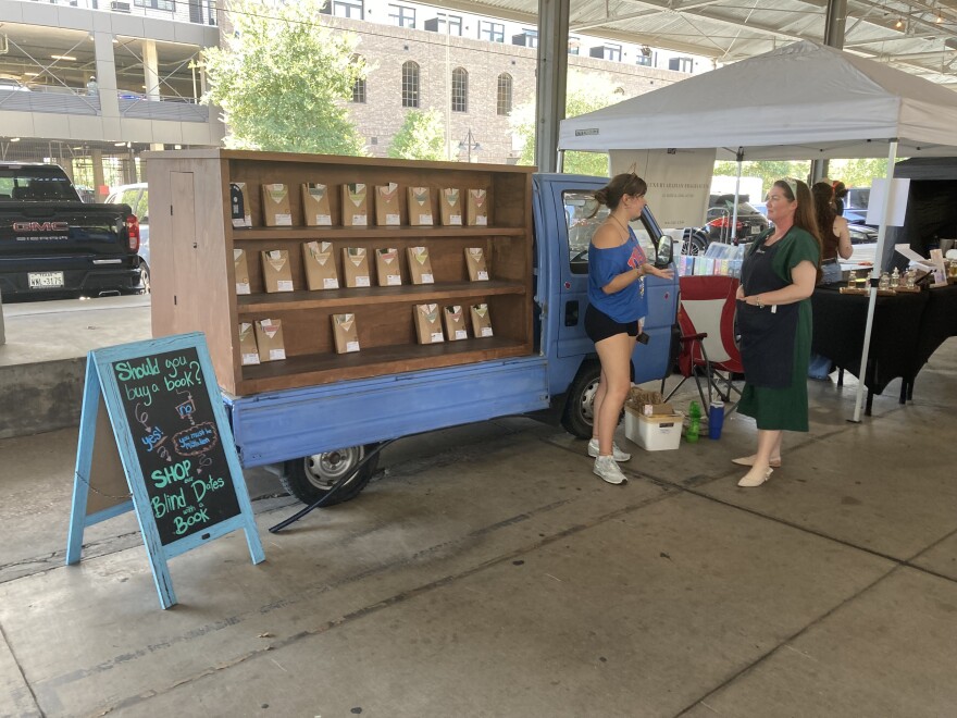 In addition to a shop inside the Market Building at the Farmers Market, Storytellers Bookstore also has a bookmobile outside in The Shed among the fruits and vegetables.