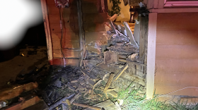 A picture of the side of a Kamas home after a driver crashed into the building.