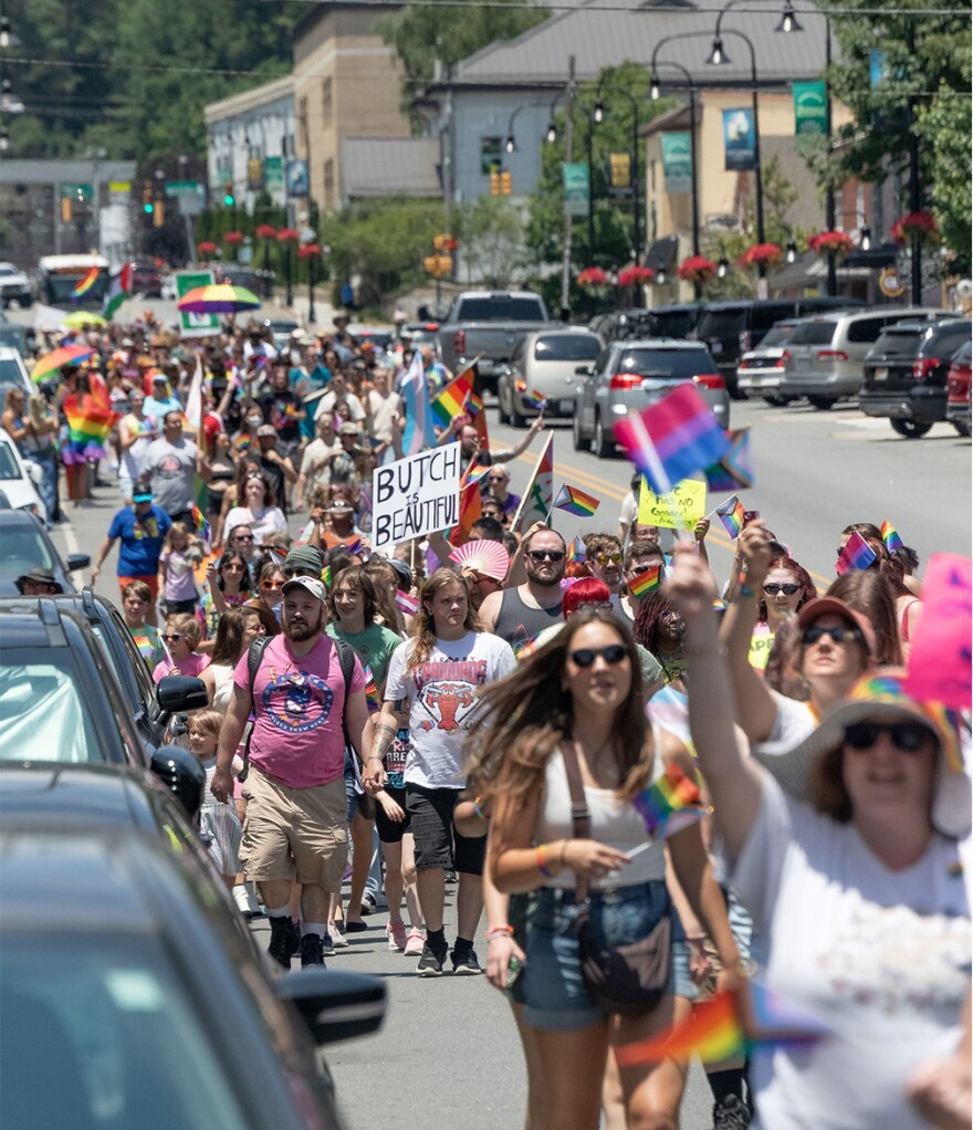 People march through Boone for the 2024 Boone Pride Parade and Festival.