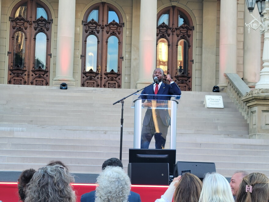 Martell Bivings speaks in front of the Michigan State Capitol on Aug. 27, 2022.