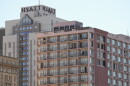 The Hyatt Regency rises behind the former Rochester Riverside Hotel in downtown Rochester, N.Y. The Hyatt is slated for a $16 million renovation. The Riverside has been vacant since closing in early 2020, and awaits a proposed $61 million redevelopment by local developer Angelo Ingrassia and Ellicott Development that would convert the property into a mixed-use complex with hotel rooms, apartments, retail and restaurant space.