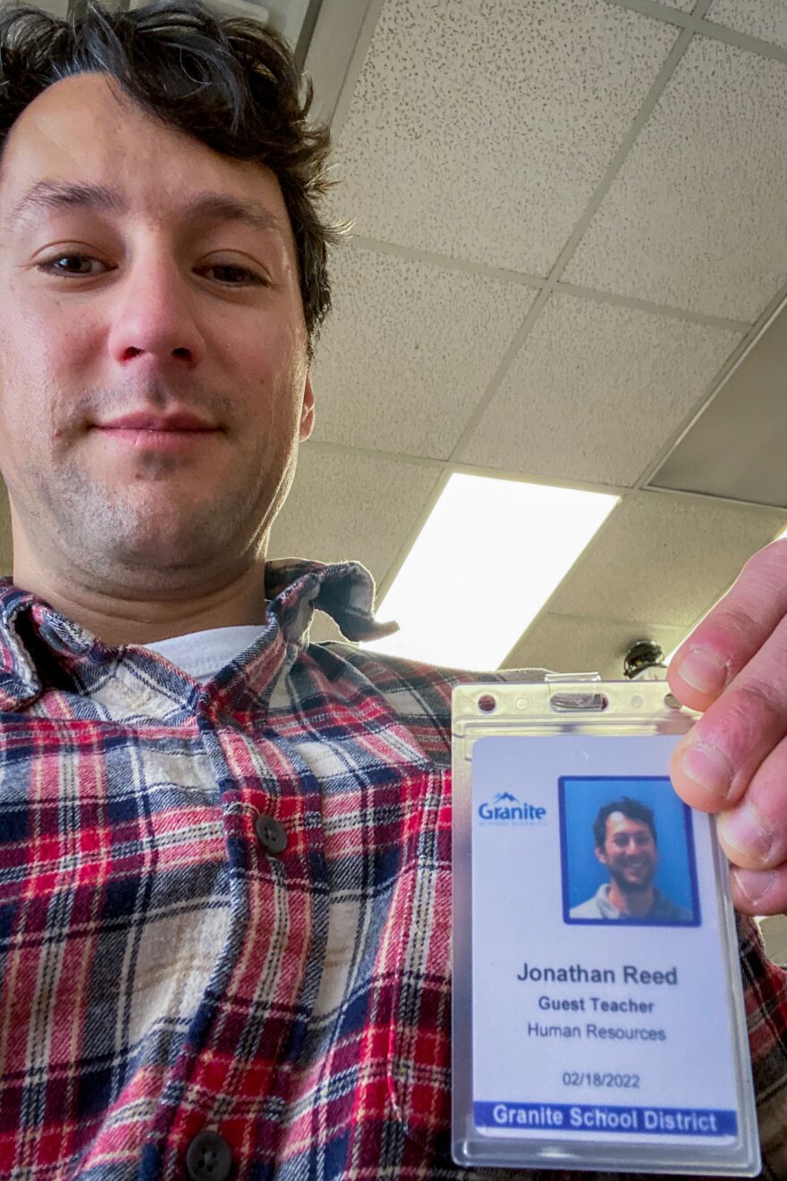 A selfie of KUER's Jon Reed, all badged up and ready for his first-day substitute teaching.