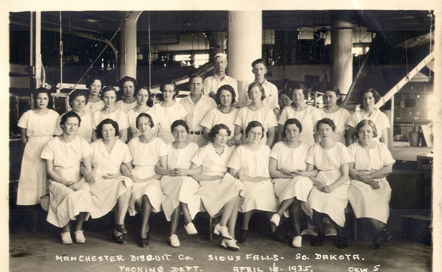 Photo of the packing department of the Manchester Biscuit Company. 