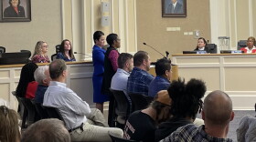 Left to right at podium-District Judge Lindsay Hughes Thurston-Program Coordinator Kivvi Figgs