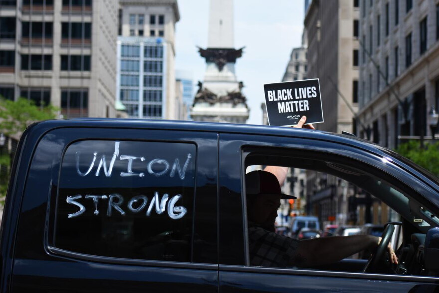 Union workers at a car rally outside the Indiana Statehouse.