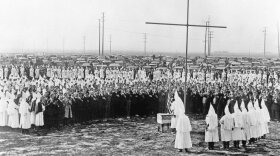 Ku Klux Klan ceremonial meeting near Los Angeles, Calif. when 800 applicants swelled the ranks of this realm to 4000 members. A crowd of people witnessed the ceremonial, February 13, 1925.