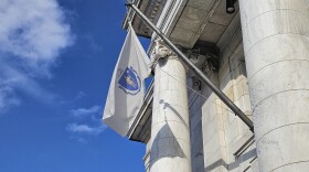The Massachusetts flag flying over city hall in Pittsfield, Massachusetts.