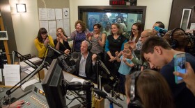 KPLU General Manager Joey Cohn, surrounded by staff and local media, announced that the Save KPLU campaign has hit its fundraising goal on May 26, 2016.