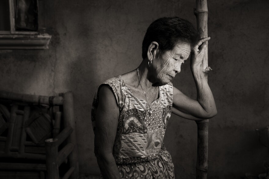 "When we arrived to the Red House, I was pushed so hard that I was knocked unconscious, so I don't recall what happened to me ... but even today, I feel the pain in my body," said Maria Lalu Quilantang, who was 9 years old when her village of Mapaniqui was attacked by the Japanese during World War II.