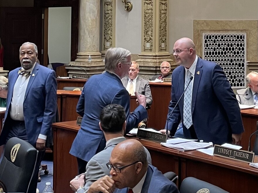 Left to right standing-Senate Minority Floor Leader Gerald Neal-Senate Majority Floor Leader Damon Thayer-London Senator Brandon Storm- Facing in the forefront-Lexington Senator Reggie Thomas