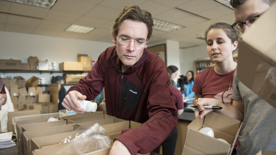 Marc Edwards and his student team assemble water test kits that will be sent to Flint, Mich., for residents to test their water for lead.