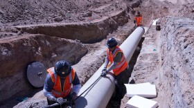 Construction workers in an undated 2020 photo, working on the Navajo-Gallup Water Supply Project. The project aims to pipe clean water to the eastern Navajo Nation, the Jicarilla Apache Nation and the City of Gallup from the San Juan river.