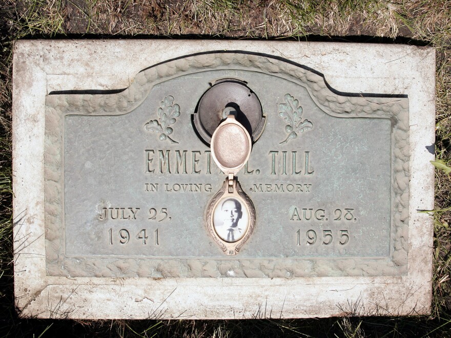 A plaque marks the gravesite of Emmett Till at Burr Oak Cemetery in Aslip, Ill. No one was convicted in his 1955 lynching.