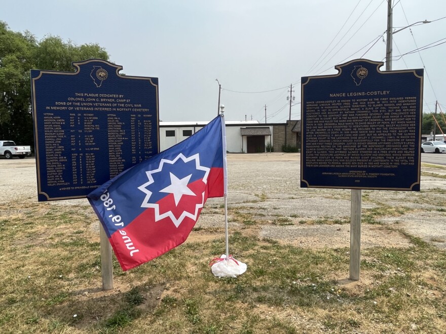 Plaques at the Freedom and Remembrance Memorial flank the Juneteenth flag, one of the Union soldiers buried in Moffatt Cemetery were present in Galveston, Texas for the first Juneteenth.