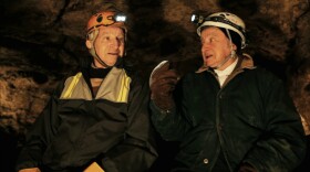 Sam and Saul Stermer, members of a family who hid in an underground Ukrainian cave in the early days of World War II, return to the hideout in <em>No Place on Earth.</em>