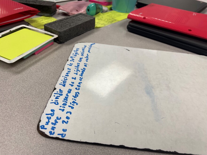 In dual language immersion programs, students are taught every subject in the language, rather than learning the language as a separate subject. This fifth grade student's math problem is written in Spanish.