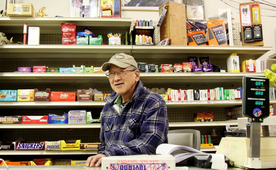 Percy Nayokpuk behind the counter at the Nayokpuk General Store, which his father opened in 1960.