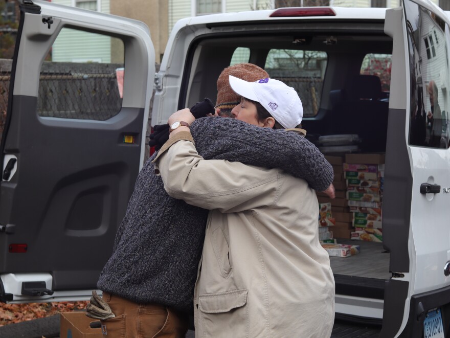 Rev. Sara Smith (right) leads a Thanksgiving food drive.