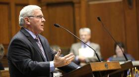 Rep. Bill Friend of Macy, shown here discussing legislation on the House floor, says he will finish out his term, but won't run again in 2018.