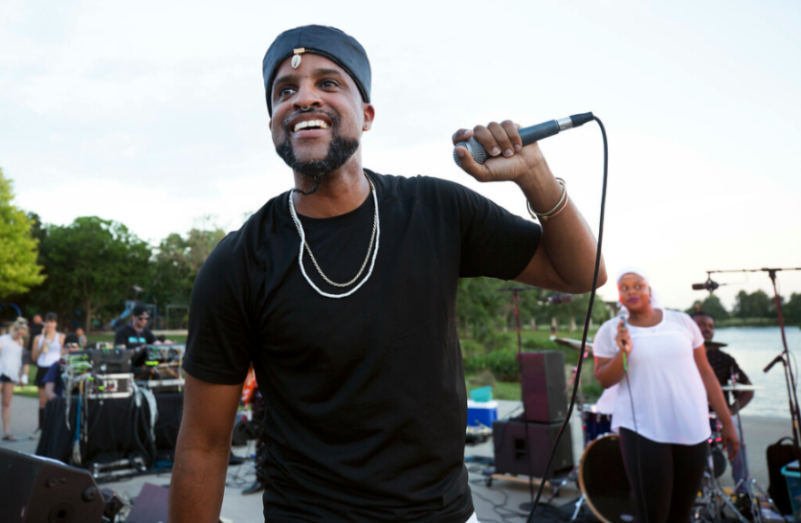 Chaka Mahone performing with Riders Against the Storm at KUTX's Rock the Park in 2018.