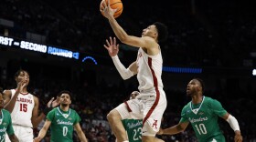 Alabama guard Jahvon Quinerly (5) last in a basket against Texas A&M Corpus Christi in the first half of a first-round college basketball game in the NCAA Tournament in Birmingham, Ala., Thursday, March 16, 2023. (AP Photo/Butch Dill)