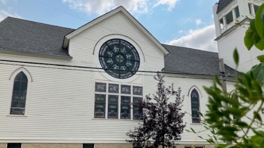Exterior with restored "rose" window