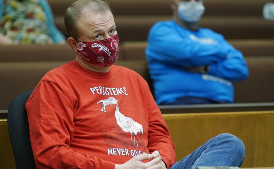 Tim Eyman listens Wednesday during a session of Thurston County Superior Court in Olympia. Eyman, who ran initiative campaigns across Washington for decades, will no longer be allowed to have any financial control over political committees, under a ruling