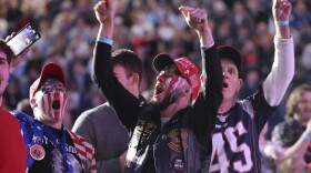 Attendees cheer during a campaign rally for former president Donald Trump, Saturday, Dec. 16, 2023, in Durham, N.H.