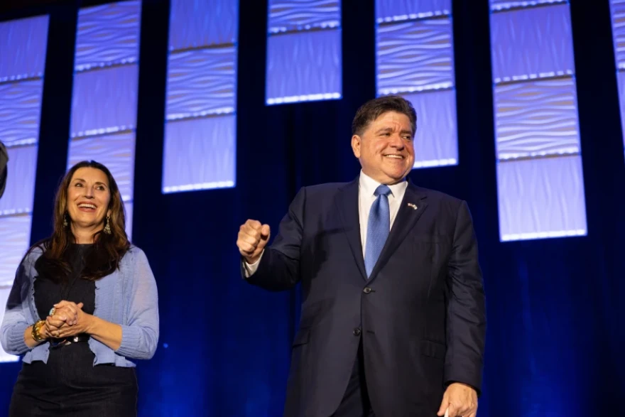Democratic Gov. JB Pritzker and convention co-chair Barbara Canales appear at the Texas Democratic Convention in Corpus Christi, June 26. Pritzker is pouring millions into the coffers of Democratic campaigns across the country.