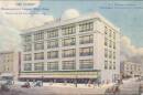 Image of a five-story department store with people walking on a broad sidewalk and early 1900s automobiles driving down the streets. Postcard image titled My Store, Bloomington's largest department store designed by A.L. Pillsbury.