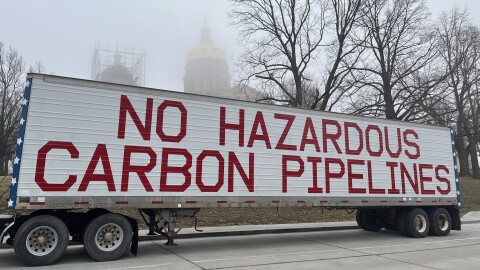 A message protesting carbon capture pipelines sits outside the Iowa Capitol.