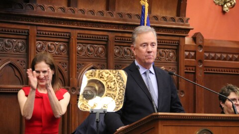 Lieutenant Governor Susan Bysiewicz (D) claps as Governor Ned Lamont delivers his State of the State address.