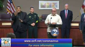 Dr. Raul Pino addresses the media on Thursday March 26th. Image: Orange TV