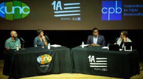 Guests Rod Moraga, Katie Dickinson, and Congressman Joe Neguse at a live taping of 1A at the Boulder Theater
