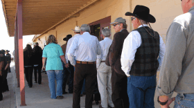 Family, friends and fellow ranchers lined up at the high school field house in Douglas, Ariz., to attend the funeral of Robert Krentz, who was found shot to death on his ranch along the Mexico border last month.