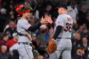 Cleveland Guardians' Cade Smith (36) is congratulated by Patrick Bailey after clinching a post season playoff spot following a baseball game against the Boston Red Sox, Thursday, Sept. 24, 2026, in Boston. 