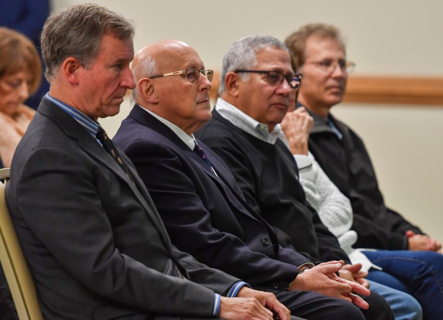 From left, U.S. Rep. Matt Cartwright and Wilkes-Barre Mayor George Brown listen during Monday's presentation at the JCC.