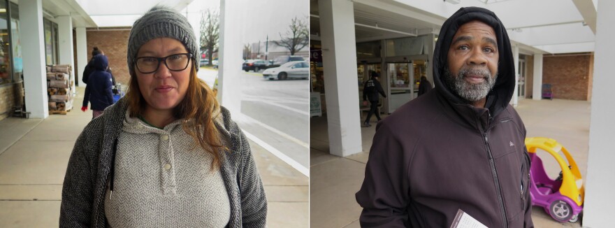 From left, Michele Howard, who works for the Indian Health Service, and Terrence Graham, who works at the State Department. Both picked up free food at a pop-up food bank in Rockville, Md.
