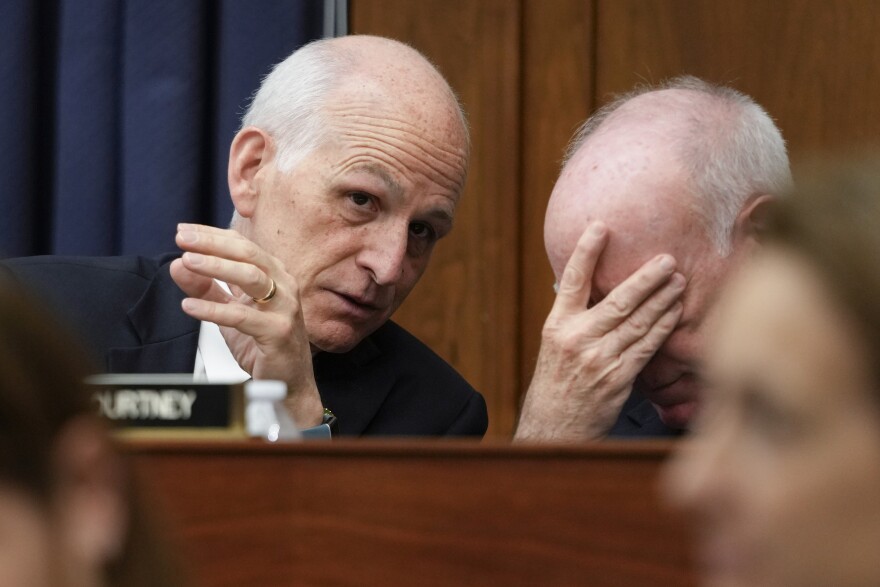 House Armed Services Committee Ranking Member Rep. Adam Smith, D-Wash., speaks with Rep. Joe Courtney, D-Conn., during the House Armed Services Committee hearing on the Department of the Navy's budget request for fiscal year 2024, on Capitol Hill in Washington, Friday, April 28, 2023. (AP Photo/Carolyn Kaster)