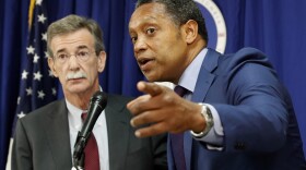 District of Columbia Attorney General Karl Racine, right, accompanied by Maryland Attorney General Brian Frosh, speaks during a news conference in Washington, Monday, June 12, 2017, to discuss the lawsuit they filed against President Donald Trump. (Alex Brandon/AP)