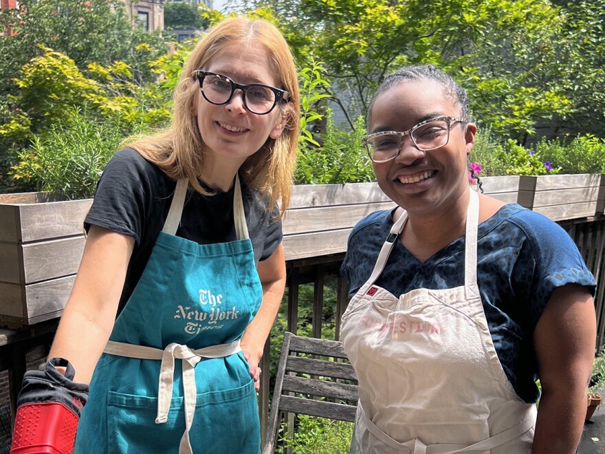 Melissa Clark and NPR's Ayesha Rascoe pose with the cheesy baked pasta.