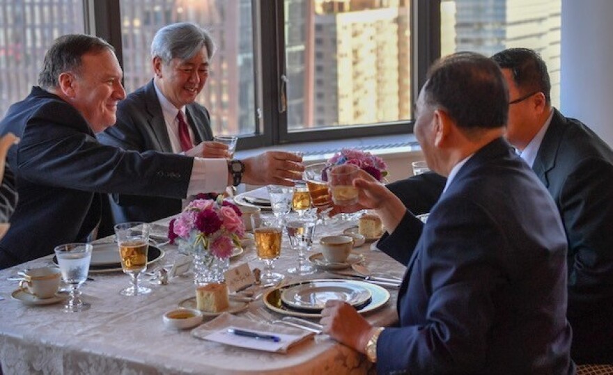 Secretary of State Mike Pompeo, the former CIA director, and CIA official Andrew Kim, the pair on the left, have dinner with North Korea's Kim Yong Chol, a former intelligence chief, in New York on Wednesday. Current and former spy chiefs are playing an unusually prominent role in arranging a proposed summit between President Trump and North Korean leader Kim Jong Un.