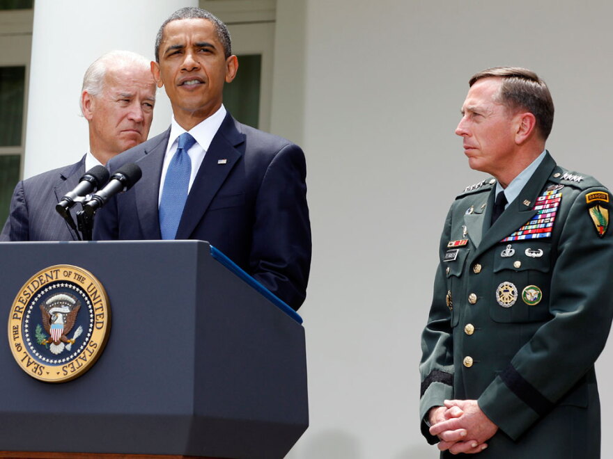 President Obama stands with Gen. David Petraeus (right) and Vice President Biden on Wednesday in the Rose Garden as he announces that Petraeus will replace Gen. Stanley McChrystal.