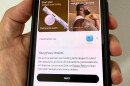 smartphone shows a website on a screen that depicts ads with a disclaimer headlined "Your Privacy Choices"