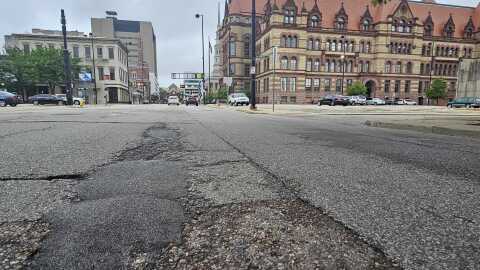 A filled pothole in front of City Hall