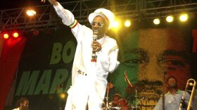 Jamaican reggae star Bunny Wailer performing at a concert in Kingston, Jamaica, in 2005 to celebrate his late bandmate Bob Marley's 60th birthday.