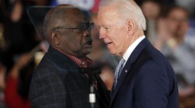 Then-Democratic presidential candidate Joe Biden talks to Rep. James Clyburn, D-S.C., at a primary night election rally in Columbia, S.C., Feb. 29, 2020 after winning the South Carolina primary. President Biden has frequently referenced the critical role South Carolina played in his nomination. He points to his decades-long relationship with the state whose Black voters handed him a major win at a desperate time for his Democratic campaign. But, in recent interviews with The Associated Press, some Black voters in South Carolina who supported Biden reluctantly — or not at all — say they’re unimpressed and even dispirited. (AP Photo/Gerald Herbert)