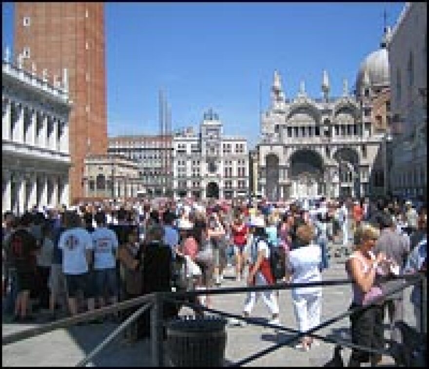 These tourists crowded in St. Mark's Square (Piazza San Marco) are among 20 million annual visitors to Venice.