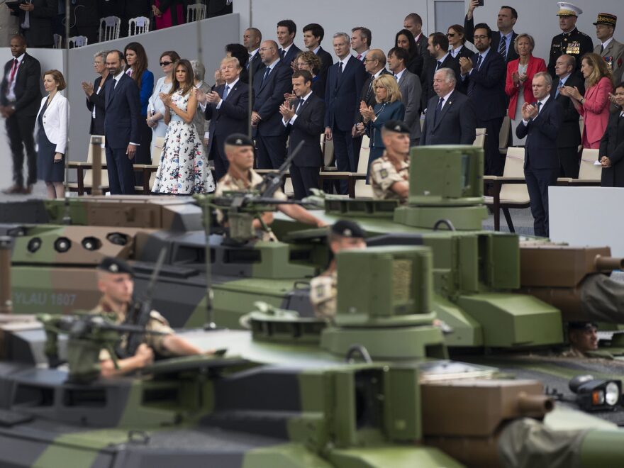 Tanks parade past President Trump, first lady Melania Trump, French President Emmanuel Macron and his wife Brigitte Macron, on July 14 during the Bastille Day parade on the Champs Elysees avenue in Paris. Trump requested the Pentagon plan a similar parade for Washington, D.C., and they've produced five options ranging in cost from $3 million to $50 million.